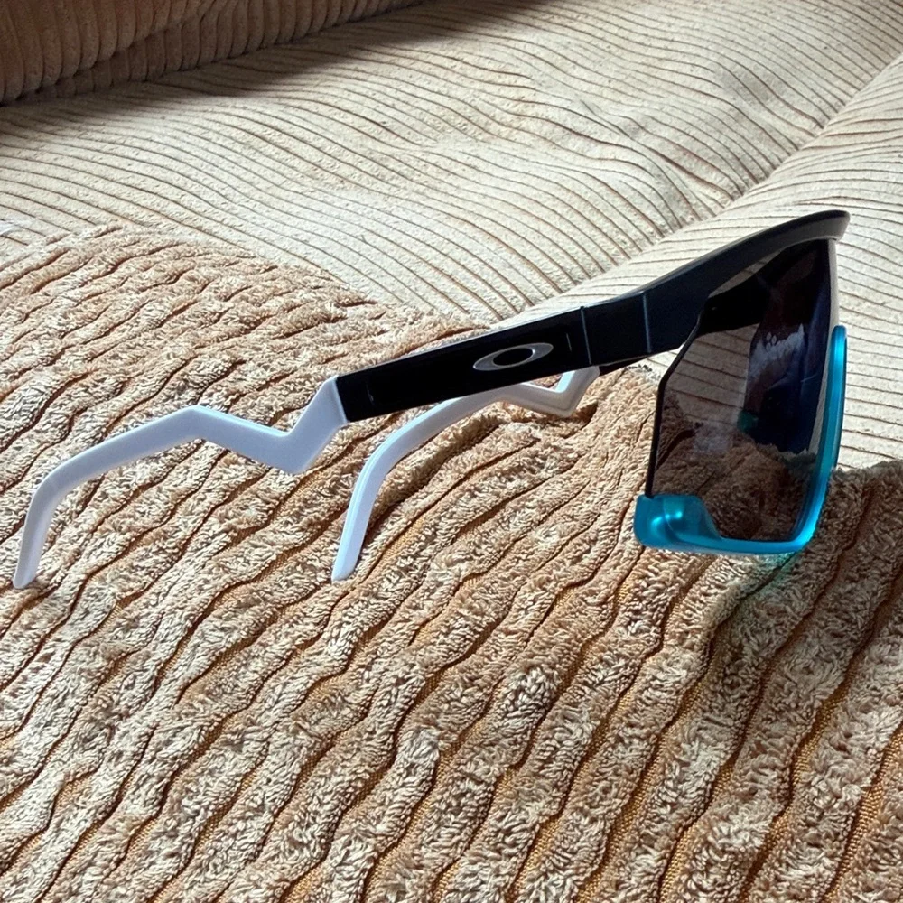 Oakley Sport Wrap Sunglasses with Teal Accent and Black Lens